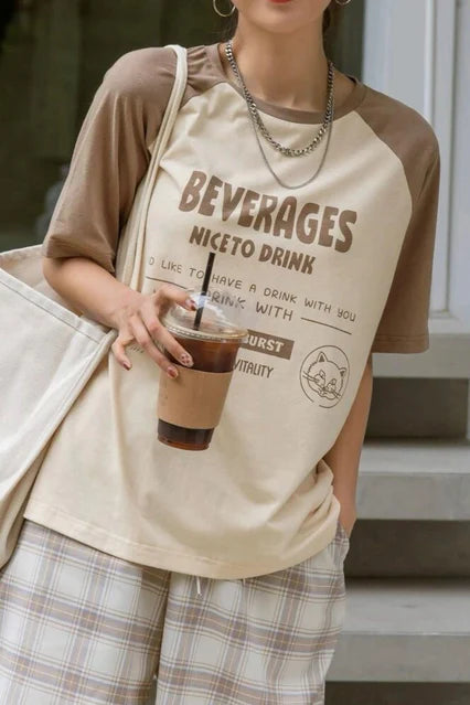 T-shirt unisexe surdimensionné à manches raglan et imprimé boissons